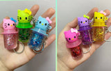 Hello Kitty keychain Color changing Glitter lip gloss