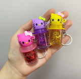 Hello Kitty keychain Color changing Glitter lip gloss